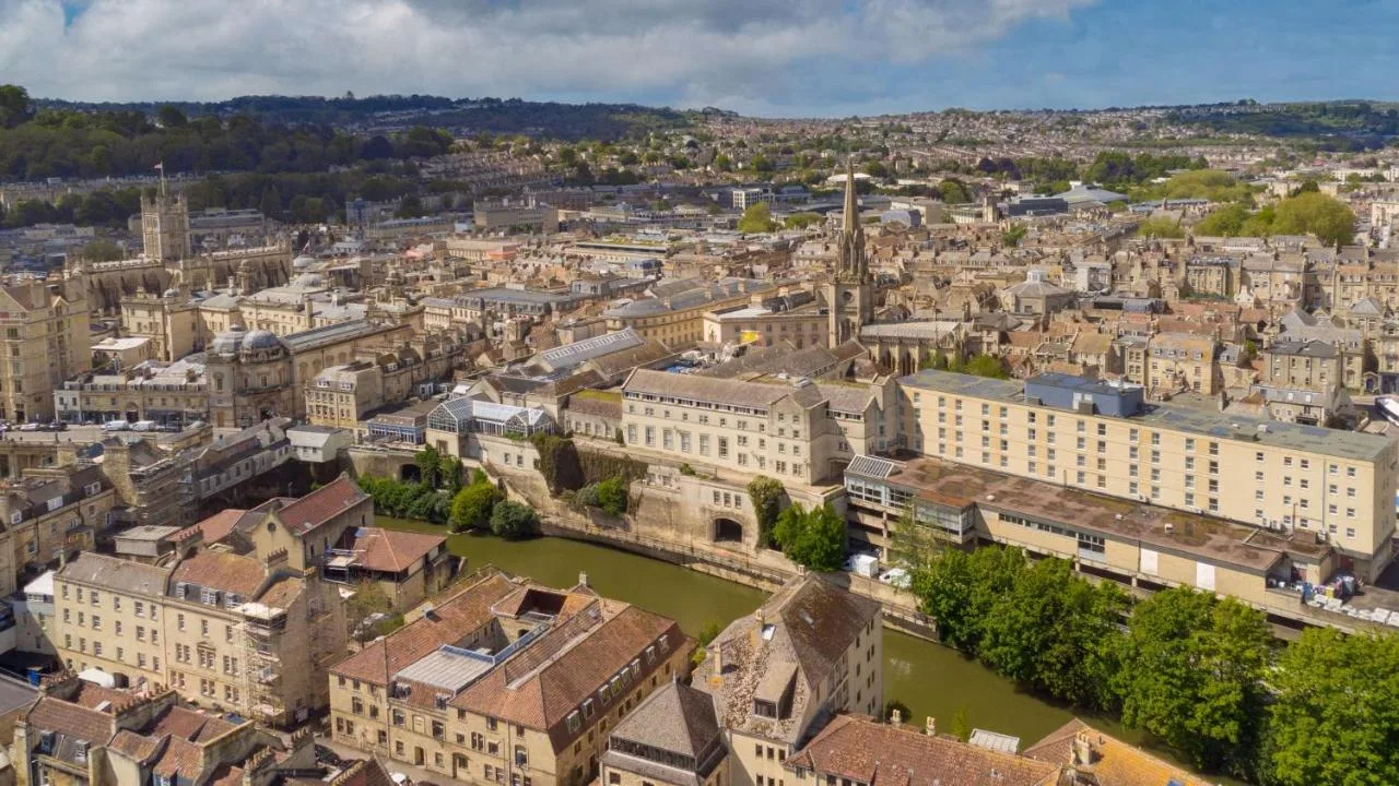 an aerial view of a city with a river at DoubleTree by Hilton Bath in Bath